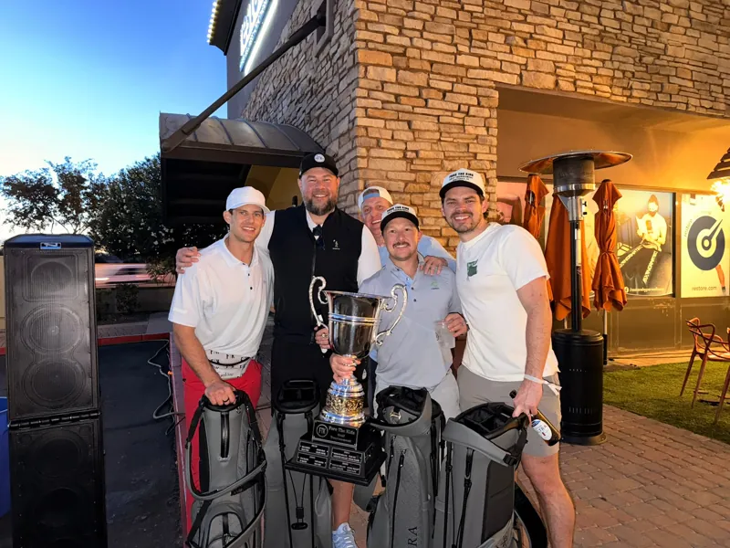 Tournament champions with the trophy